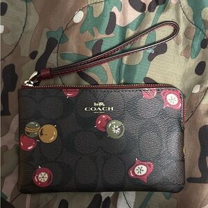 Holiday Coach Black Wristlet with Red and Green Accents